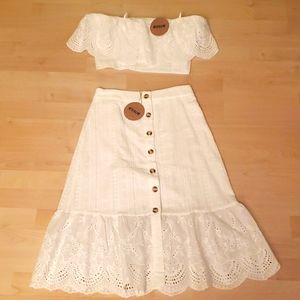 White eyelet crop top and skirt.